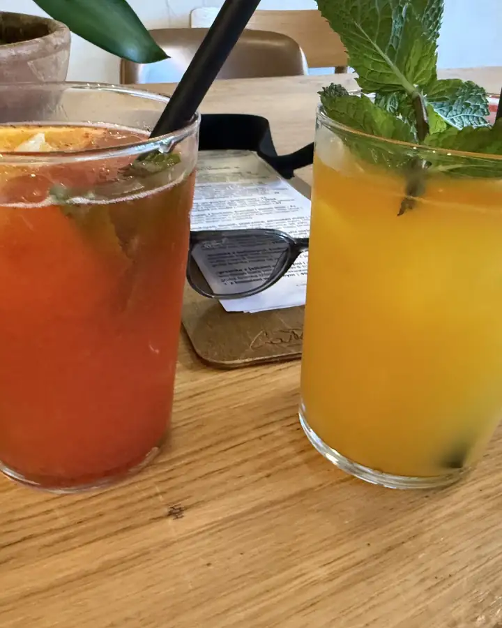 Two lemonades with mint — red and orange