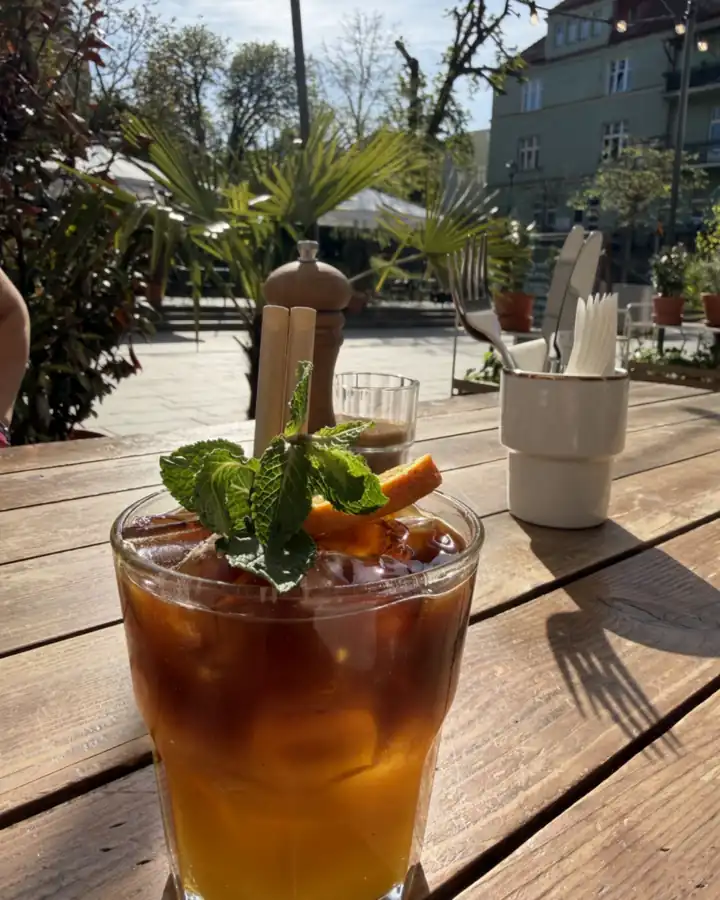 A cocktail with ice and mint on the terrace